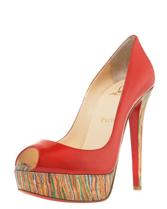 High-gloss red patent leather Christian Louboutin heels are timeless.